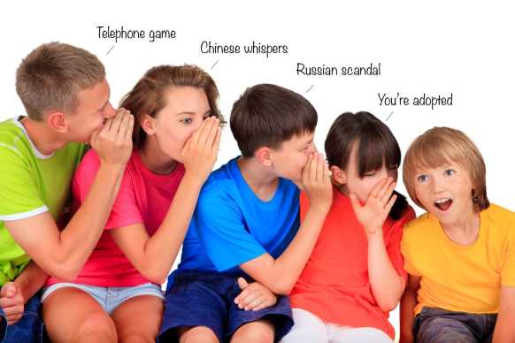 Family-playing-telephone